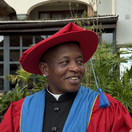 Portrait of Rev. Jasper Tumuhimbise, CCHCL Group Chief Executive Officer